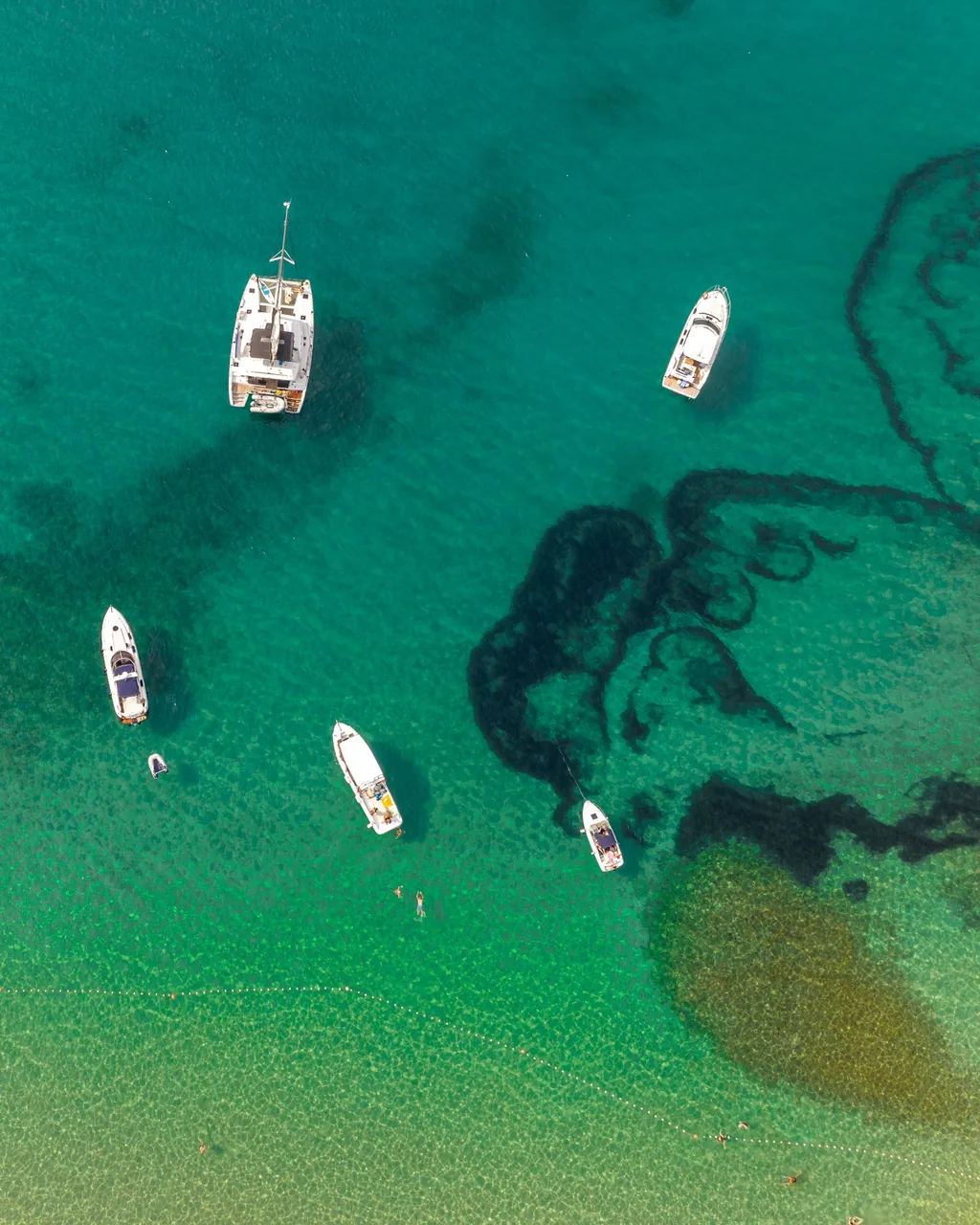 Lagoon 380 catamaran anchored in turquoise bay near Brač